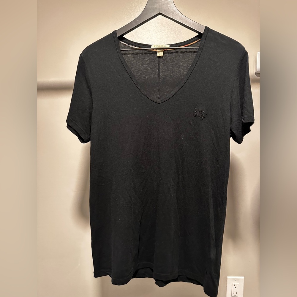 Burberry Check T Shirt
Women’s size Large
No signs of wear/holes